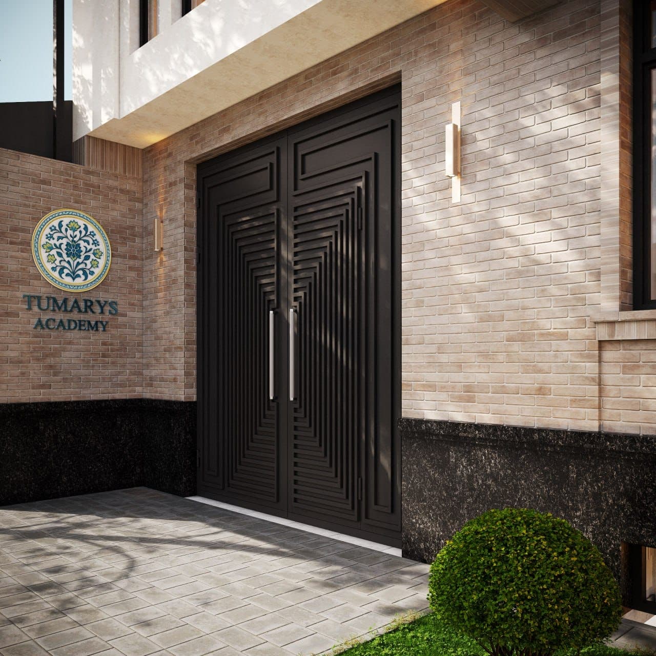 The Academy’s emblem, a turquoise and gold flowering medallion, set into the brick beside the entrance with the words Tumarys Academy beneath it.